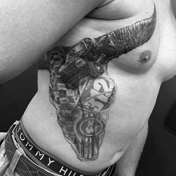 Rib Cage Side Male Bull Skull Themed Tattoo Design