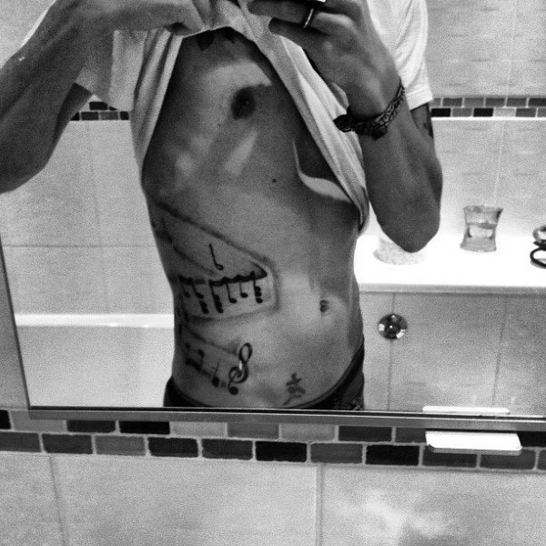 Rib Cage Side Music Notes Tattoos For Males