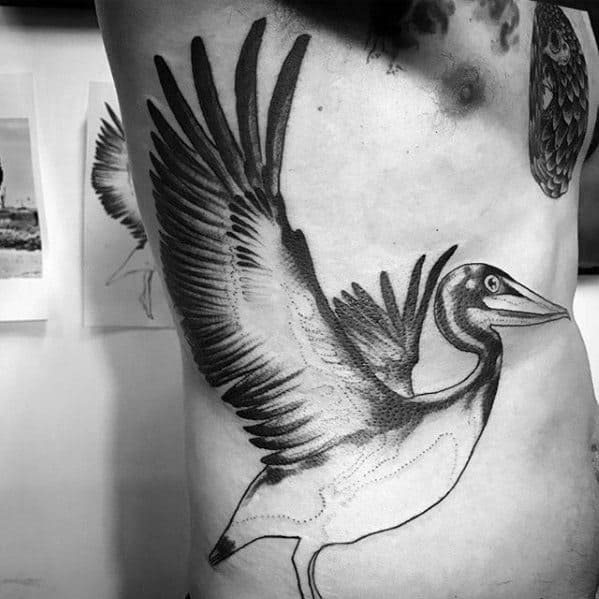 Rib Cage Side Of Body Creative Flying Pelican Tattoos For Men