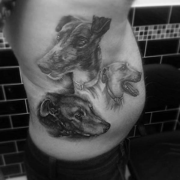 A stunning black and grey tattoo showcasing three detailed portraits of greyhounds, each captured in different expressions, highlighting the dog's elegance and personality.