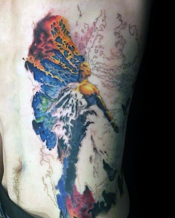 Colorful nebula tattoo featuring a dynamic figure with cosmic elements and abstract background details