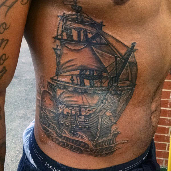 Rib Cage Side Sailboat At Sea Tattoo For Men
