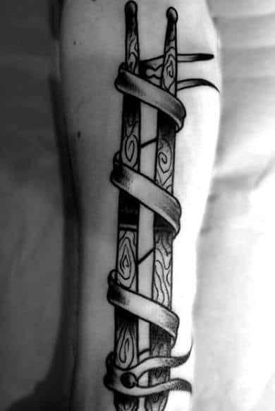 Ribbon Wrapped Around Wood Drum Sticks Forearm Guys Tattoos