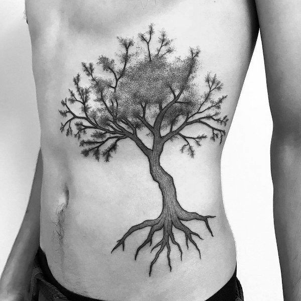 Black and grey dotwork tattoo of a detailed tree with sprawling branches and deep roots, covering the side of the torso, symbolizing strength and growth.