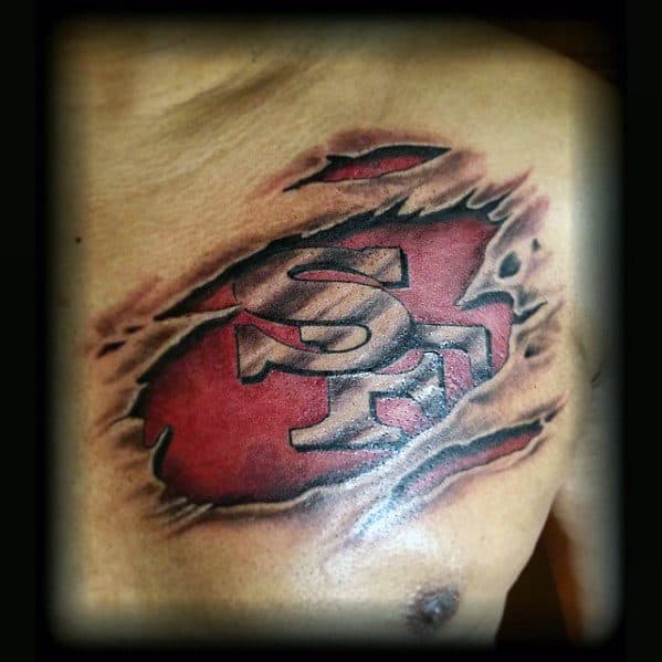 Ripped Skin San Francisco 49ers Guys Upper Chest Tattoo