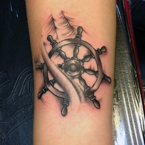 Ripped Skin Ship Wheel Tattoo For Guys On Forearm