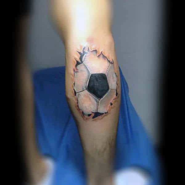 Ripped Skin Soccerball On Leg Calf Tattoo For Gentlemen