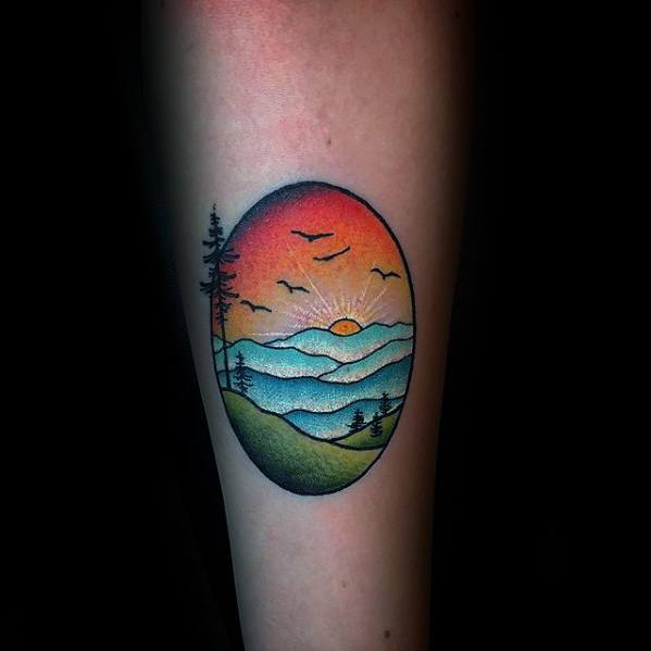 Rising Sun With Nature Scene Guys Small Colorful Forearm Tattoo