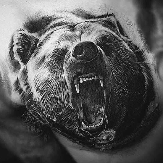Hyper-realistic roaring bear tattoo in black and grey, symbolizing raw strength, courage, and fierce protection.