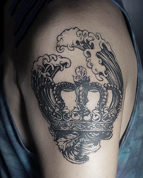 Roaring Waves And Crown Tattoo On Biceps Male
