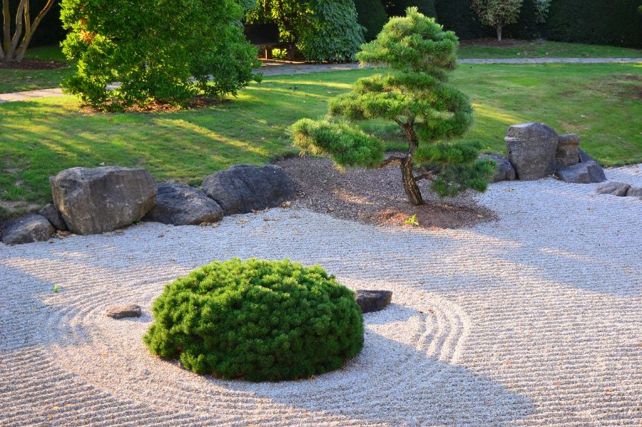 small japanese garden raked sand rock border 