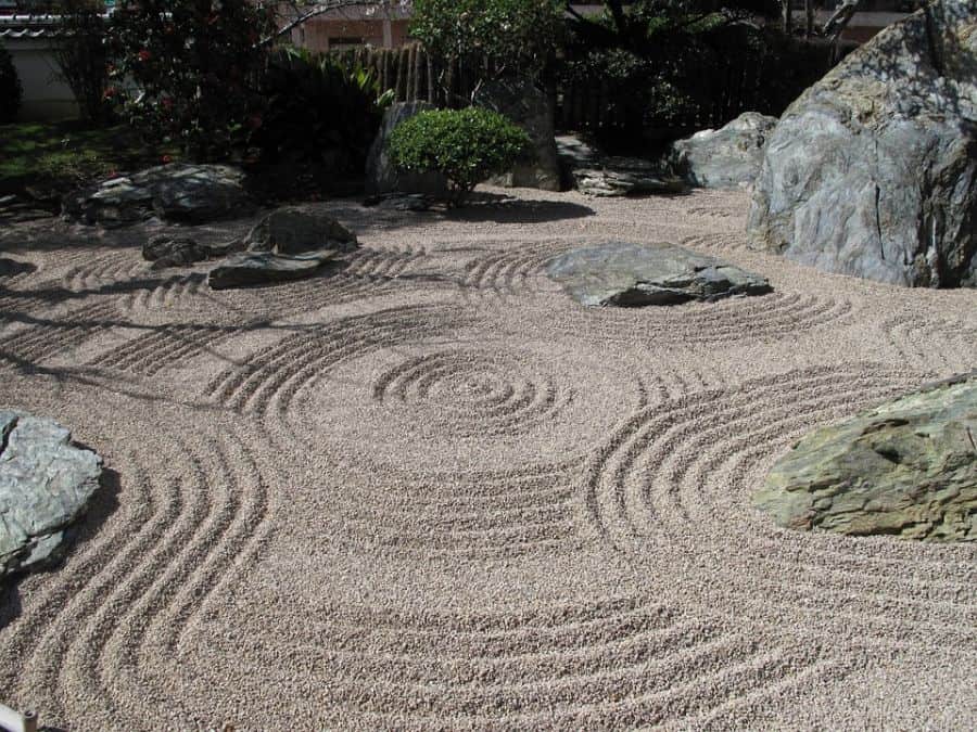 peaceful raked zen garden with rocks 