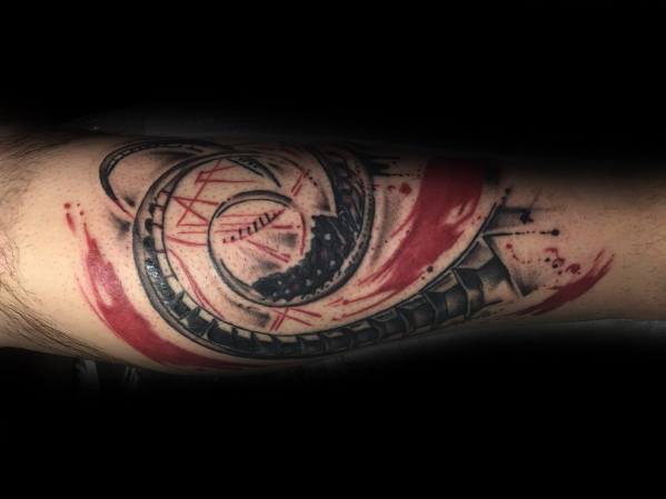 Dynamic roller coaster tattoo with intense curves and loops, accented by bold red brush strokes and dark shading.