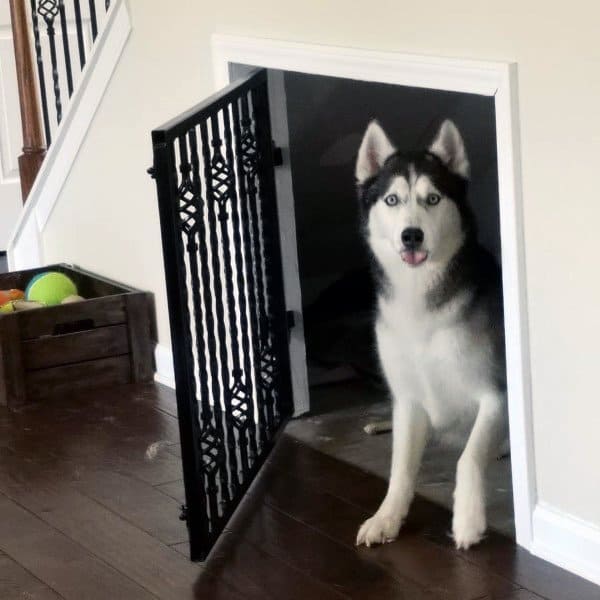 dog house under the stairs black metal gate