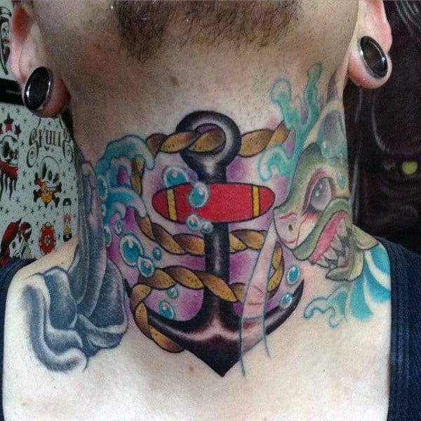Colorful throat tattoo of a black anchor wrapped in a golden rope, with ocean waves and a sea creature in a bold traditional style