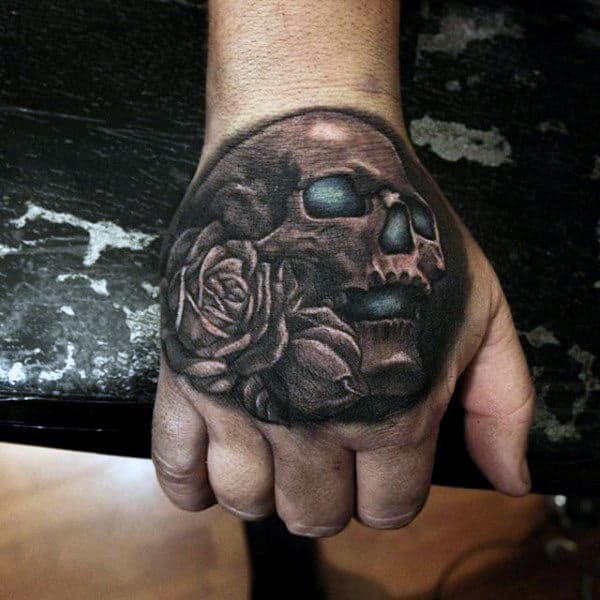 Rose Flower With Glowing Blue Skull Mens Hand Tattoo