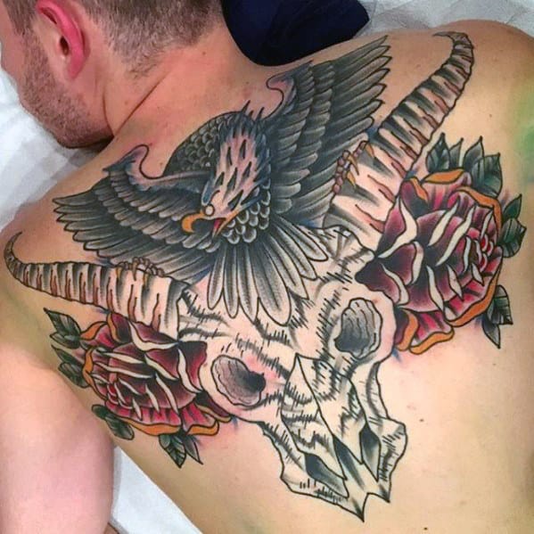 Rose Flowers With Skull And Eagle Mens Upper Back Tattoo