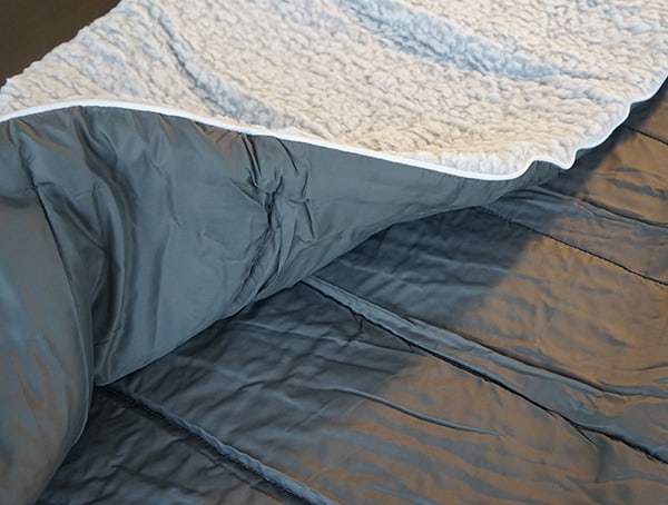 Rumpl Puffy Sherpa Blanket With Nylon Fabric On Opposite Side