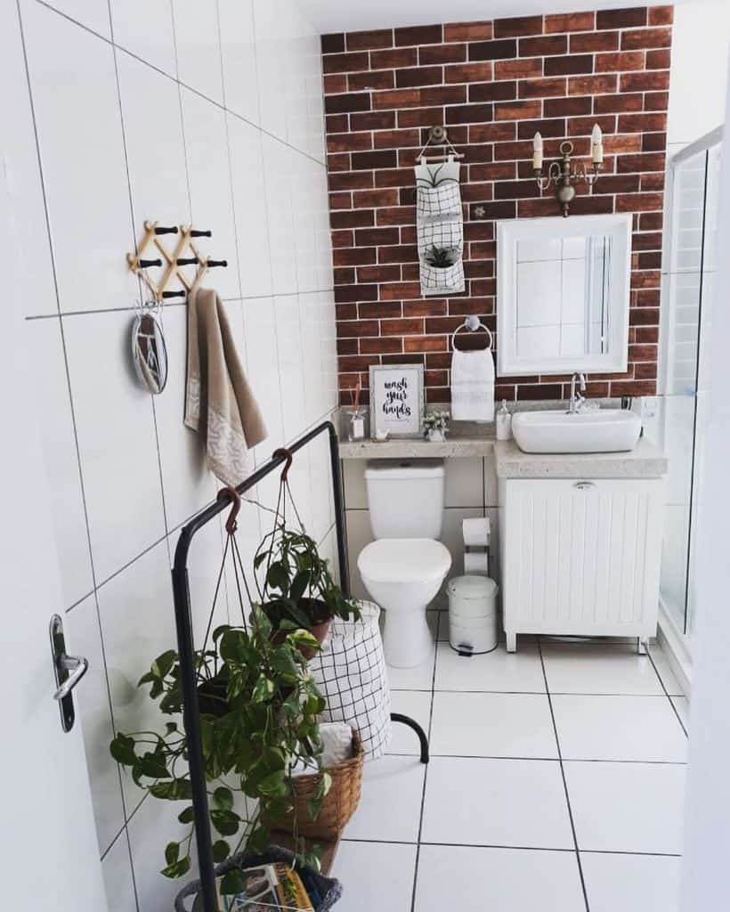rustic modern bathroom with white tiles feature brick wall