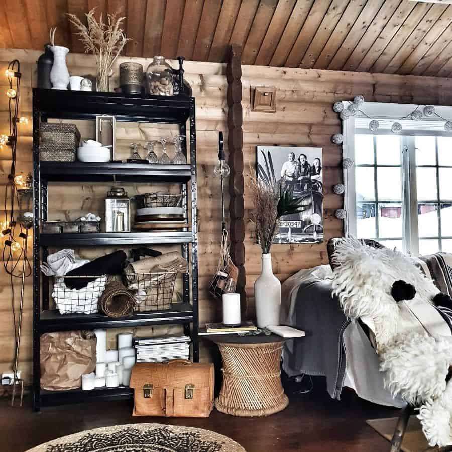 cluttered log cabin living room