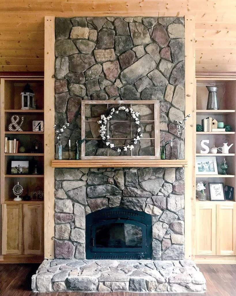stone fireplace in rustic living room