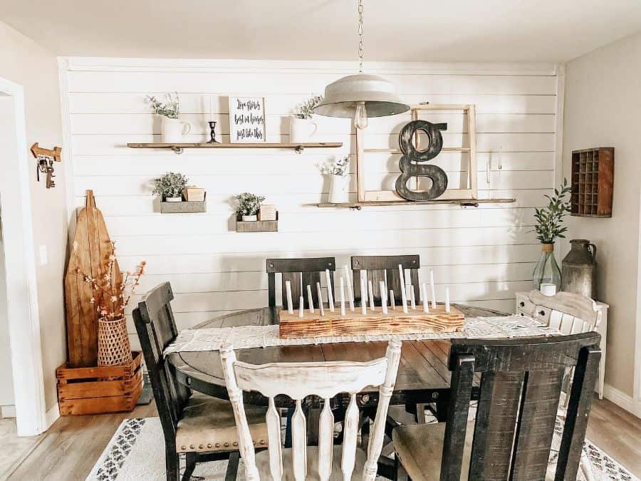 rustic dining room with shiplap feature wall