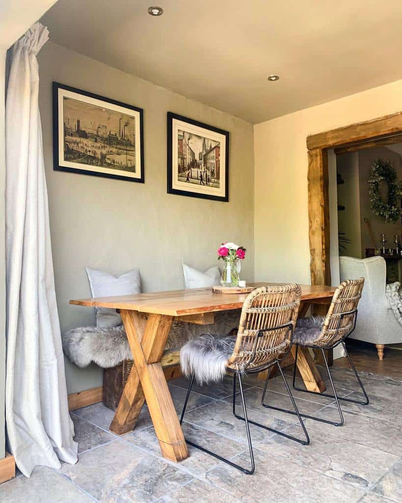 rustic dining room wood bale with chairs and bench framed wall art tile floor