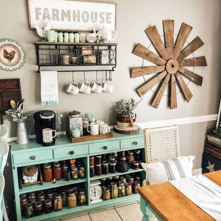 rustic farmhouse dining room with green cabinet