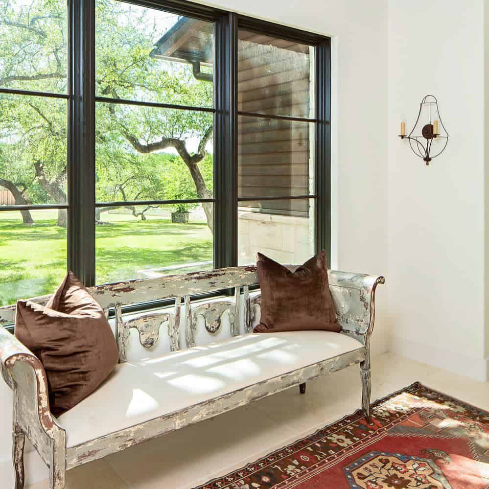 rustic bench living room black window trim floor rug