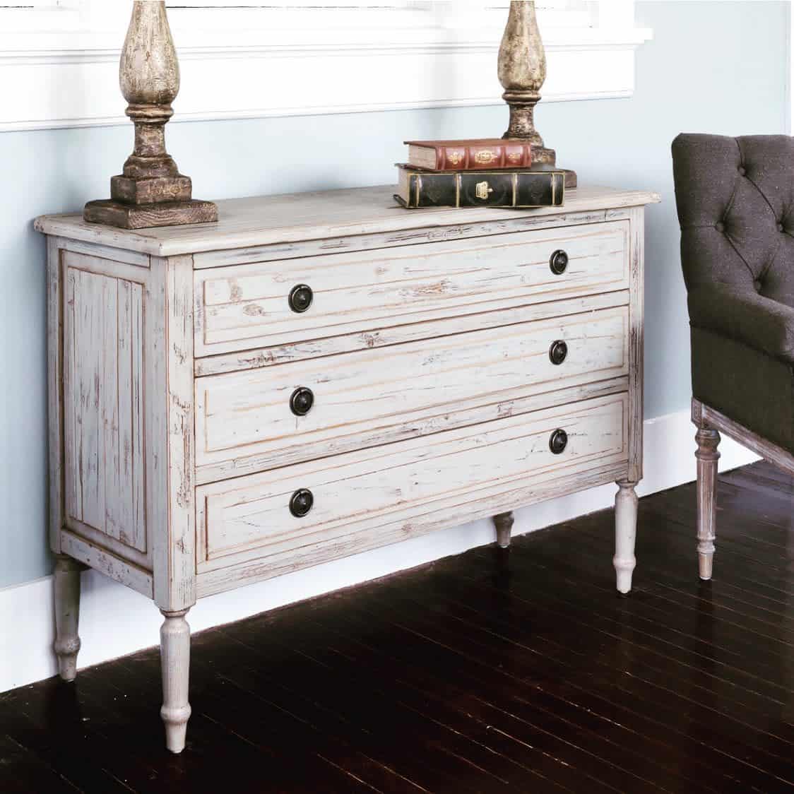 rustic vintage chest of drawers two lamps old books