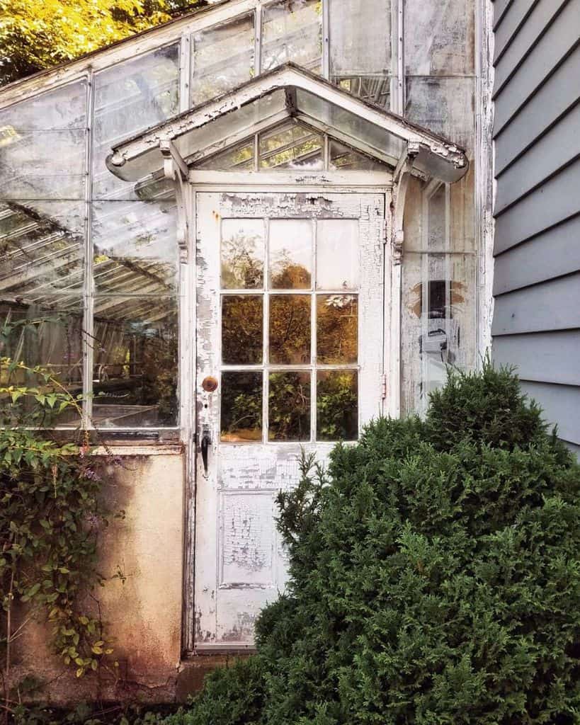 big white rustic greenhouse