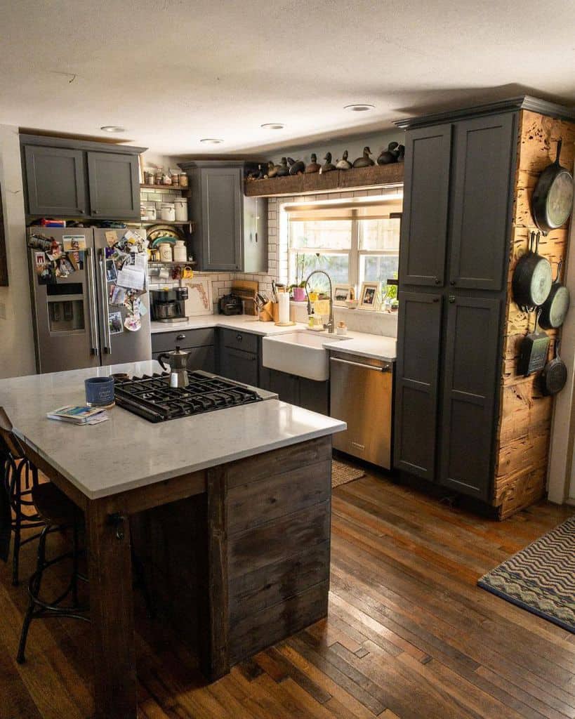rustic kitchen with gray cabinets and island
