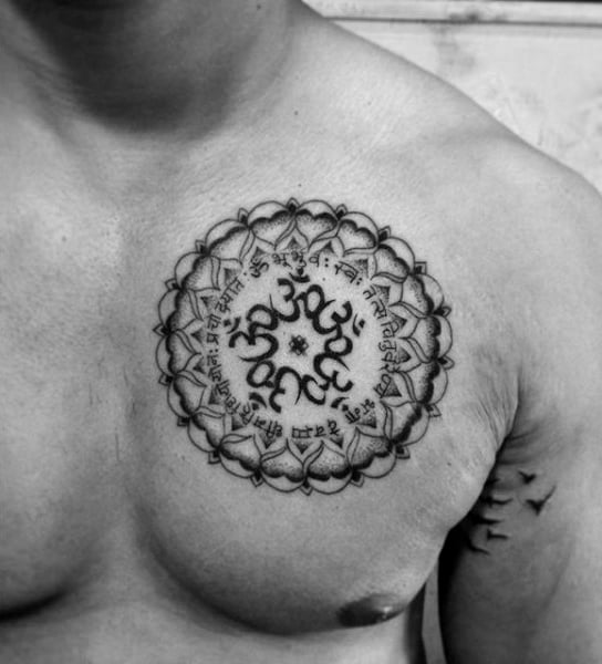 Sacred Om Smybol Guys Upper Chest Circle Tattoos