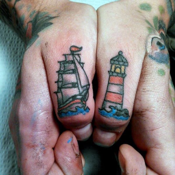 Sailing Ship With Lighthouse Male Thumb Tattoos