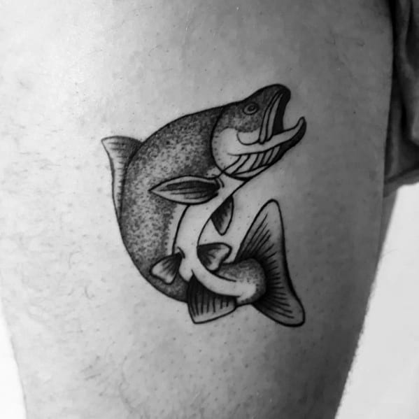 Black and grey tattoo of a leaping salmon with fine dot shading and bold outlines, placed on the thigh for a simple yet detailed design.