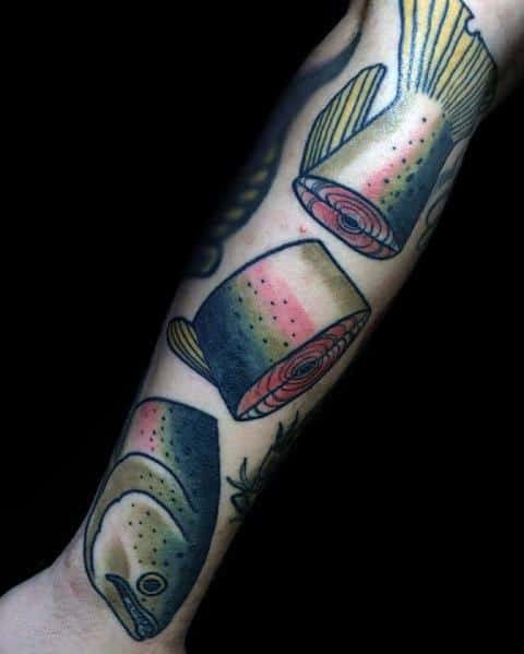 Creative tattoo of a salmon transforming into sushi slices, featuring bold outlines and vibrant colors, creating a unique and artistic forearm design.