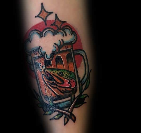 Colorful tattoo of a salmon and a frothy beer mug, featuring bold outlines and vibrant shading, creating a fun and unique design on the arm.
