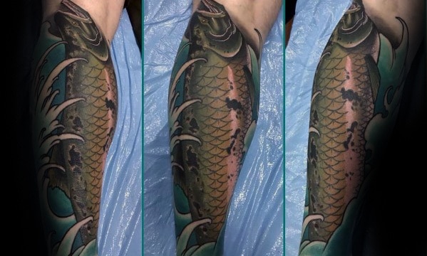 Realistic full-leg tattoo of a salmon with intricate scales, dynamic water elements, and bold shading, creating a striking and lifelike design.
