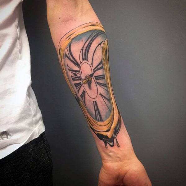 Forearm tattoo of a melting clock inspired by Salvador Dali, with gold tones, Roman numerals, and dripping black ink for a surreal effect.