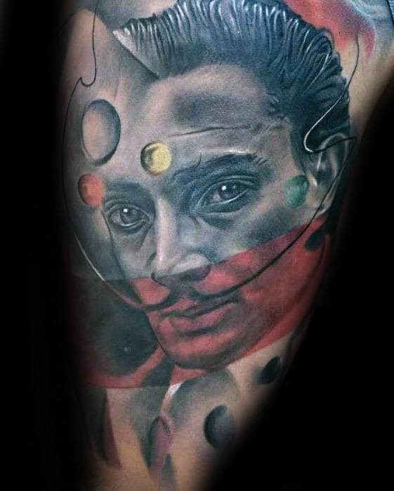 Colorful Salvador Dali tattoo blending realistic portraiture with abstract dots and surreal facial overlays in a dreamlike, painterly style.