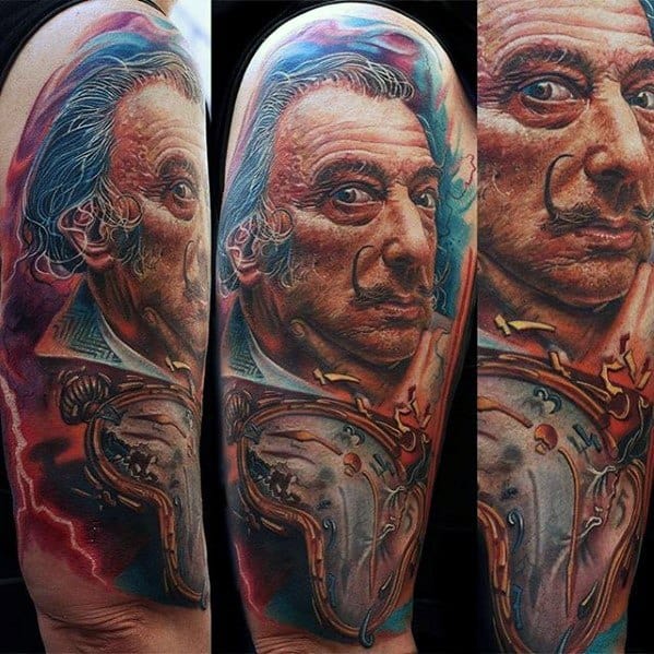 Vivid upper arm tattoo of Salvador Dali with realistic portraiture, surrounded by melting clocks and abstract swirling colors for a surreal effect.
