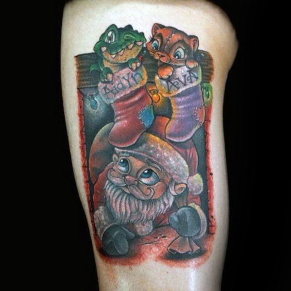 Whimsical Santa Claus tattoo with a playful design, featuring a cute Santa peeking under stockings filled with animated characters and festive details.