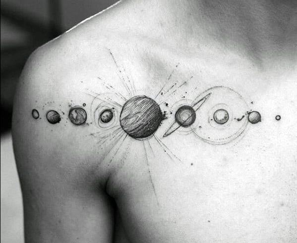 Solar system tattoo design for men across the chest with fine line planets, orbit paths, and a shaded Saturn with detailed rings.