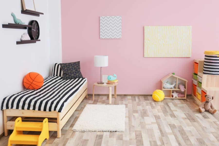pink accent wall kids bedroom wood bed