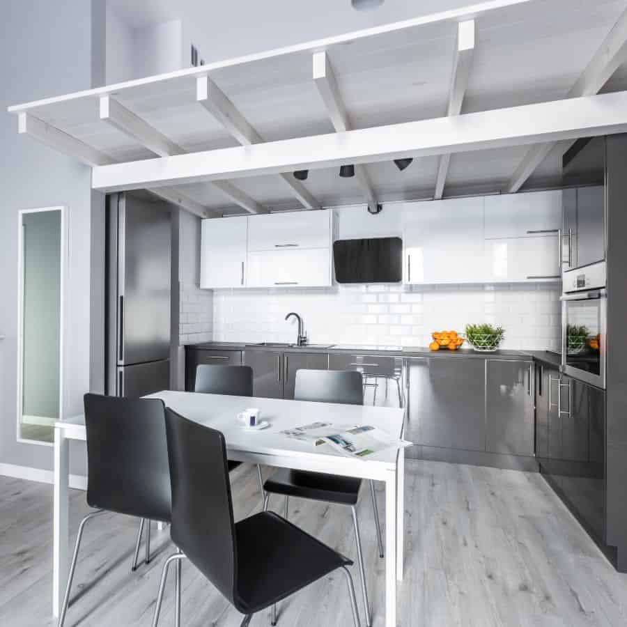 white and gray open plan kitchen