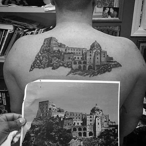 Scottish Castle On Mans Back Tattoo Design
