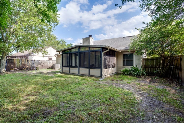screened porch with outdoor deck
