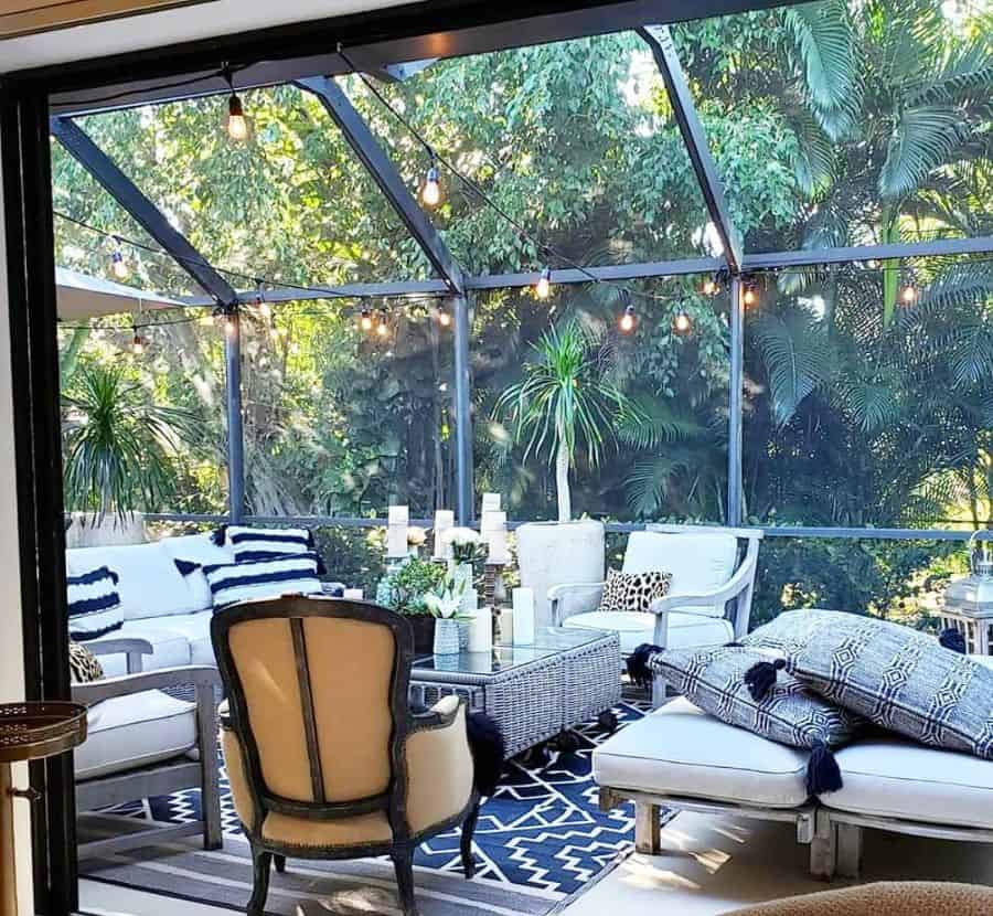 large enclosed lanai room wicker furniture string lights