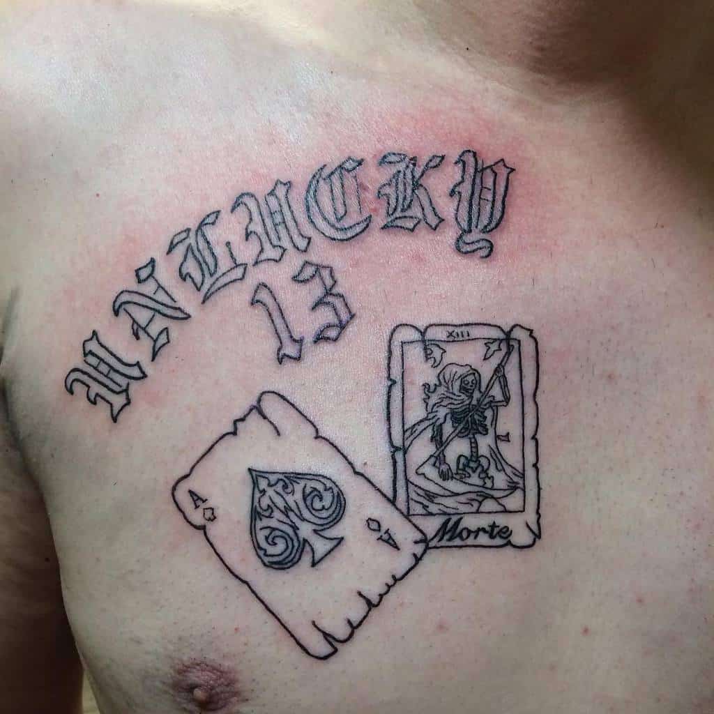 A tattoo featuring the words "UNLUCKY 13" above the Ace of Spades card, along with a "Death" card (XIII) featuring a skeleton holding a scythe with 'Morte'