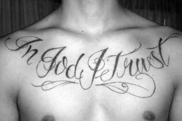 Script In God We Trust Male Upper Chest Tattoos